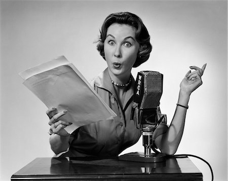 846-02796673
© ClassicStock / Masterfile
Model Release: Yes
Property Release: No
1950s WOMAN TALKING INTO RADIO MICROPHONE HOLDING PAPERS EXAGGERATED FACIAL EXPRESSION